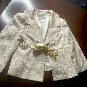 Cream with elegant design, tie front blazer
